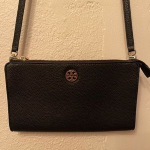 Tory Burch cross body a few years old but barley used great condition